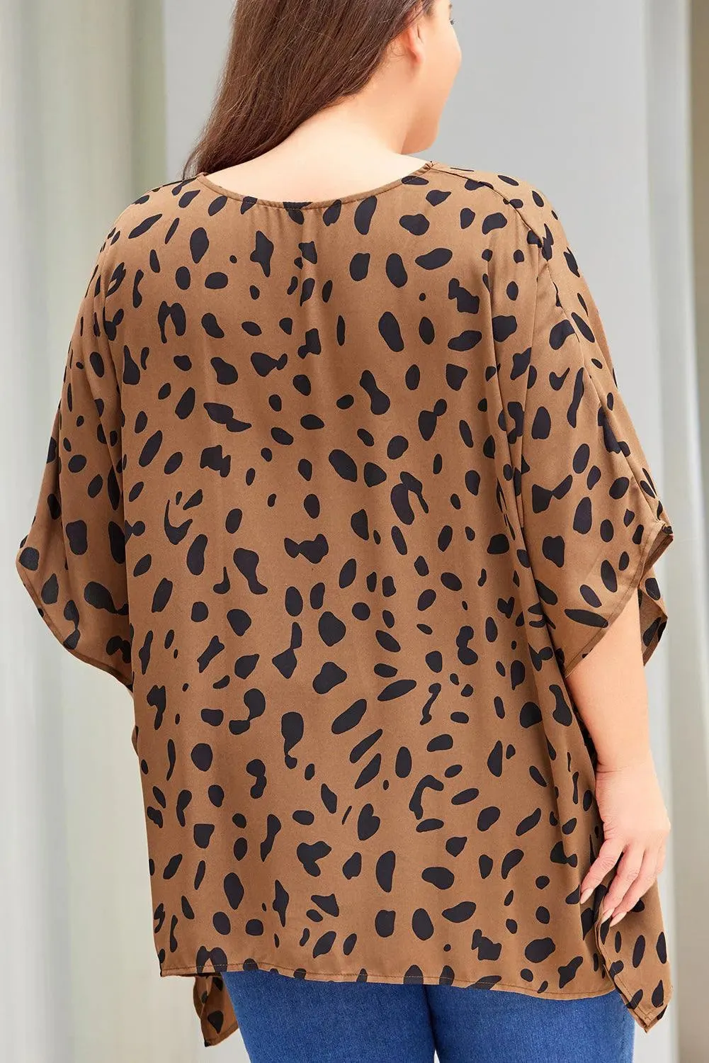 Stylish Plus Size Animal Print Blouse: Handkerchief Hem - Shop Now!